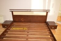 Кровать из натурального дерева сосна. размеры 2100*1660. покраска Орех темный, изголовье из дерева и вставка кож. зам.
