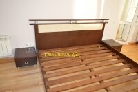Кровать из натурального дерева сосна. размеры 2100*1660. покраска Орех темный, изголовье из дерева и вставка кож. зам.